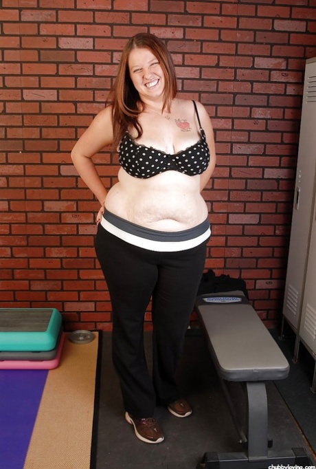 Chubby old woman with tattoos Velvet plays with her saggy boobs