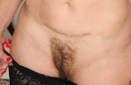 Older lady Sabina Wexler reveals beaver while stripping down to stockings