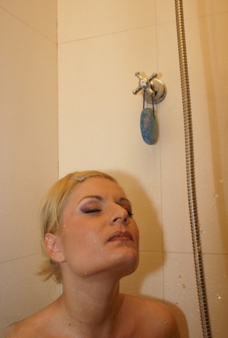Young blonde Anetta lets old men cum on her face after banging her