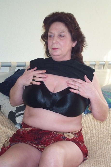 Chubby amateur mature Trudi flaunts her big tits and masturbates