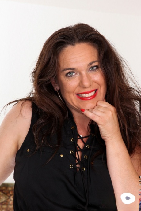 Chubby amateur MILF Katrina Sobar doffs her dress and lingerie and poses