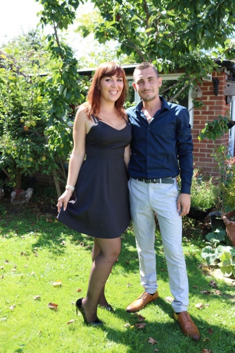Redhead mature Angelique Luka reveals her big boobs and gets fucked hard
