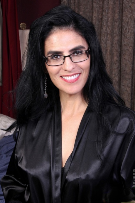 Sexy mom Theresa Soza strips her nightgown and lingerie to masturbate