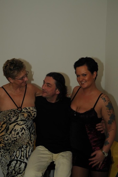 Mature German amateurs with natural big tits enjoy kitchen FFM threesome