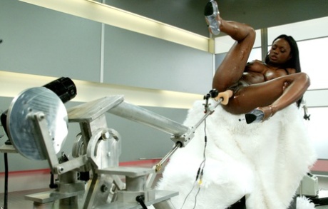 Hot ebony Jada Fire has her big tits pumped while getting toyed by a machine
