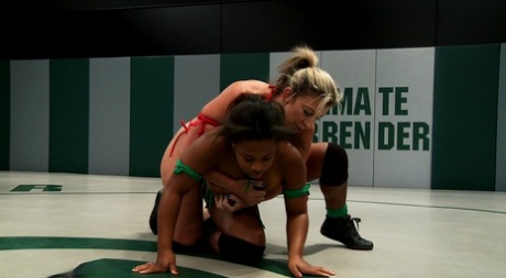 Ebony Yasmine Loven and MILF Sara Jay flaunt their big tits and wrestle