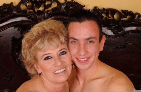 Blonde granny Margarette gives head & gets her twat dicked by a young guy