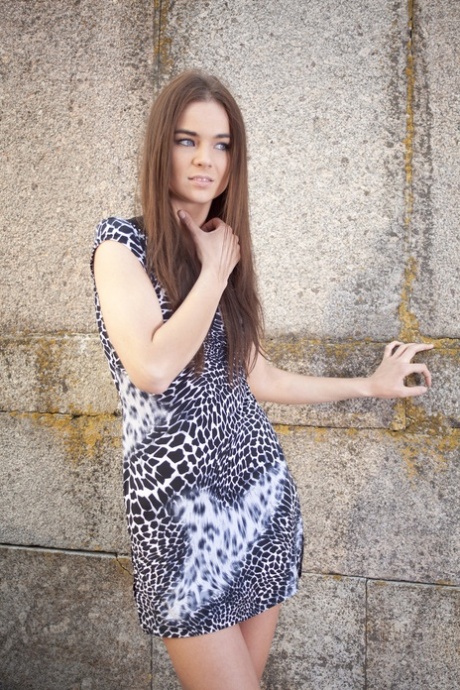 Gorgeous brunette Lachia A strips her dress & poses naked on public steps