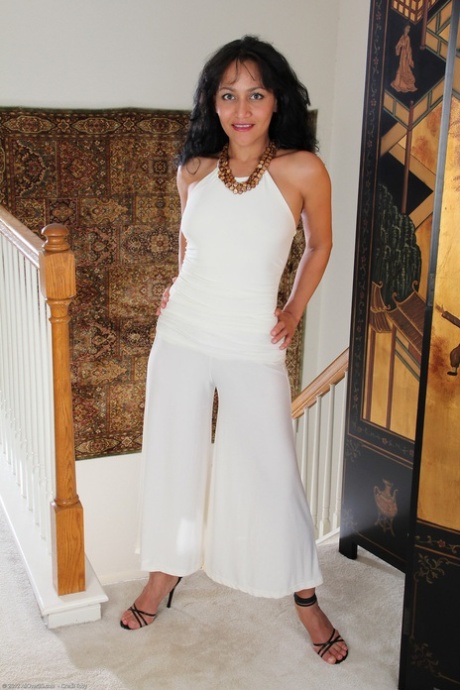 Amateur brunette Liza Rene strips her white outfit & fingers her mature muff