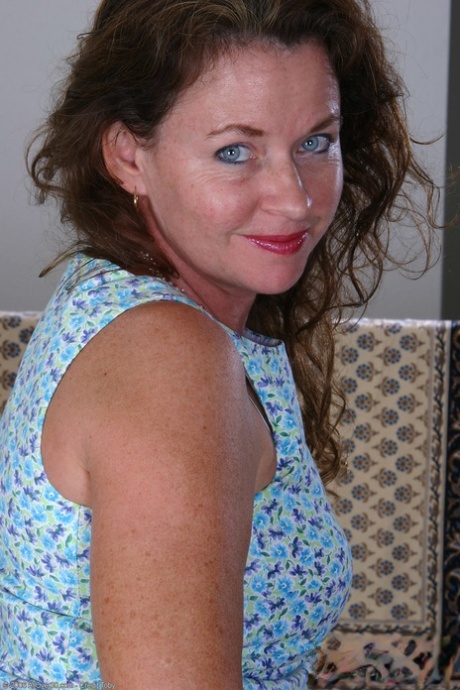 Mature fatty Sally getting rid of her clothes and spreading her trimmed cunt