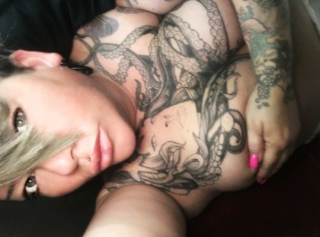 Tattooed fatty Carmen Delavega films herself touching her tits and pussy