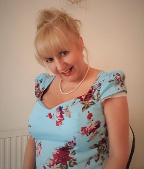 Naughty British woman Lorna Blu shows off her big ass and her big tits