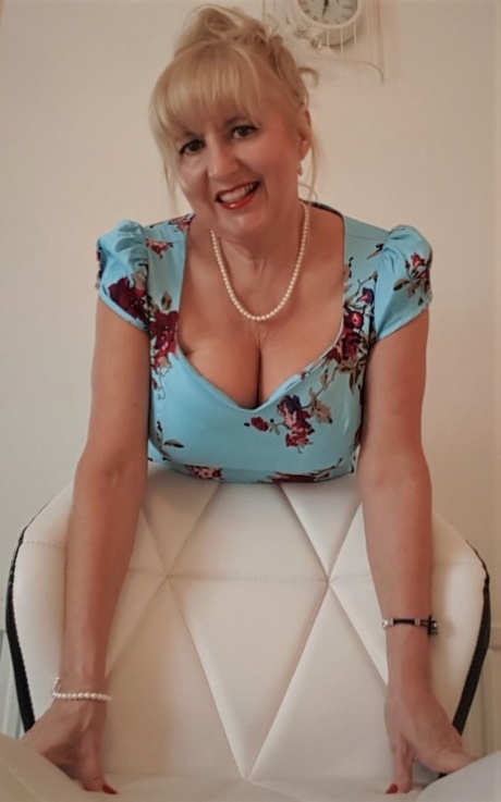 Naughty British woman Lorna Blu shows off her big ass and her big tits