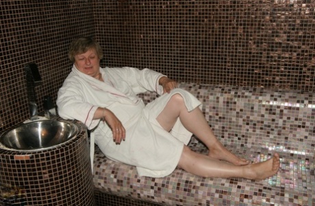 European grannies and babes strip naked to shower and chill in the sauna