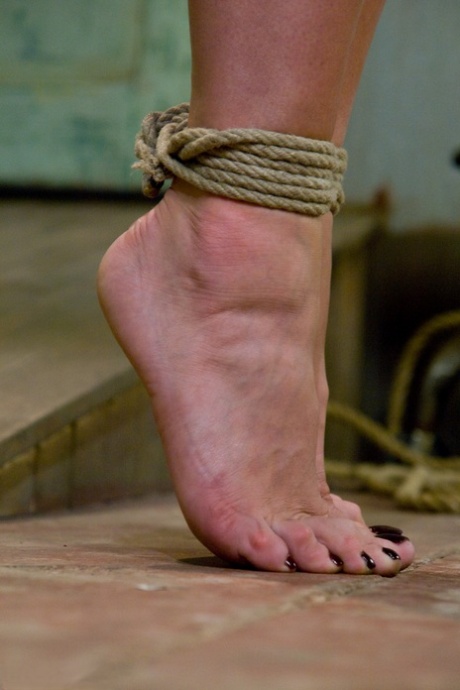 Naked lesbian Dia Zerva gets punished with a vibrator in rope bondage