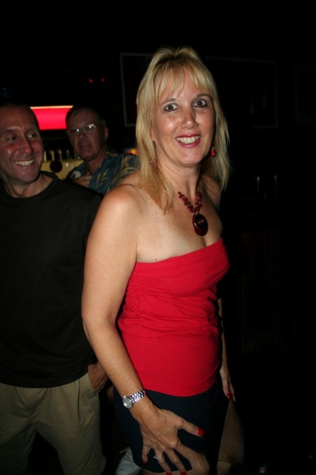 Slutty mature swinger wives expose their big tits & get naughty at a party