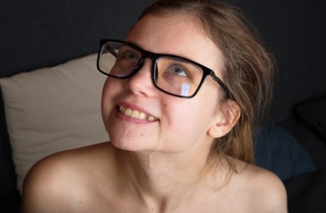 Skinny teen in glasses Bella Gray rides a big cock & takes a facial cumshot