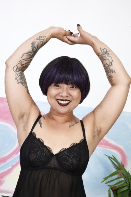 Asian honey Lulu Sparkle flaunts her natural tits, big booty and hairy twat