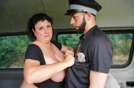 Fat granny Miranda Steel lets out her big tits and gets rammed by a cop