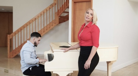 Piano teacher Mellanie Monroe seduces a student with her big tits & fucks him
