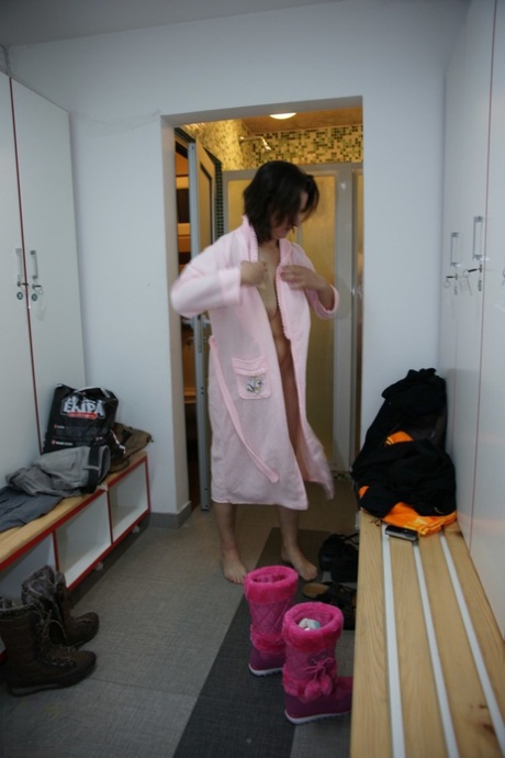 Mature women show their naked bodies while showering to get in the sauna
