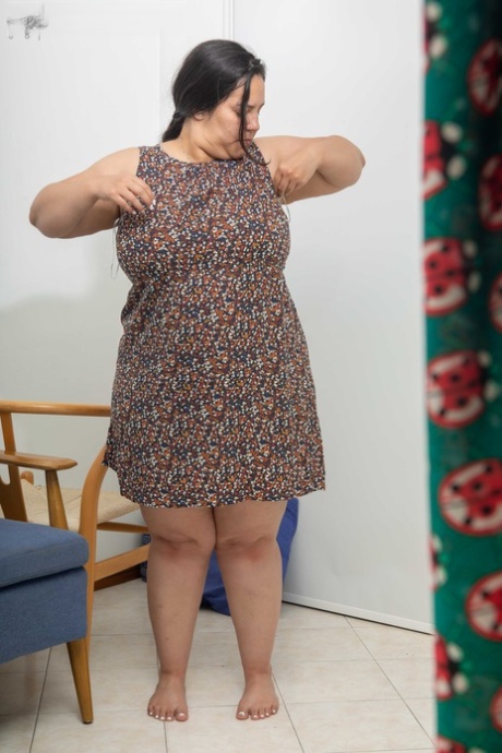 Fat amateur with huge juggs Laury gets spied on while getting dressed