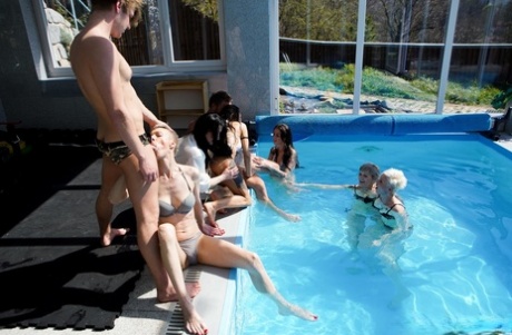 Mature women Valentina Sierra & Belinda Bee fuck young men in a poolside orgy