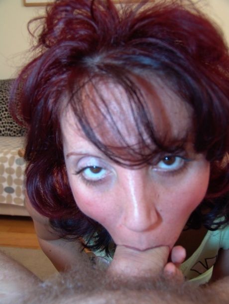 Mature wife Jutka licks her man's feet & gives him a hot POV blowjob