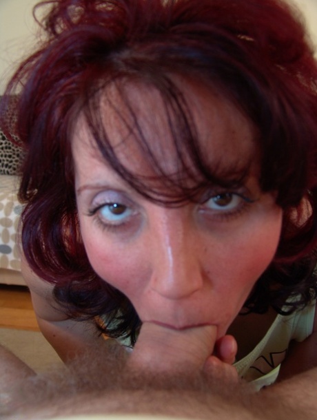Mature wife Jutka licks her man's feet & gives him a hot POV blowjob
