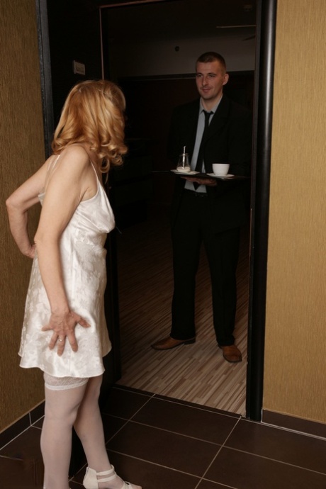 Mature blonde Maira B gets orally pleased and boned by a young businessman